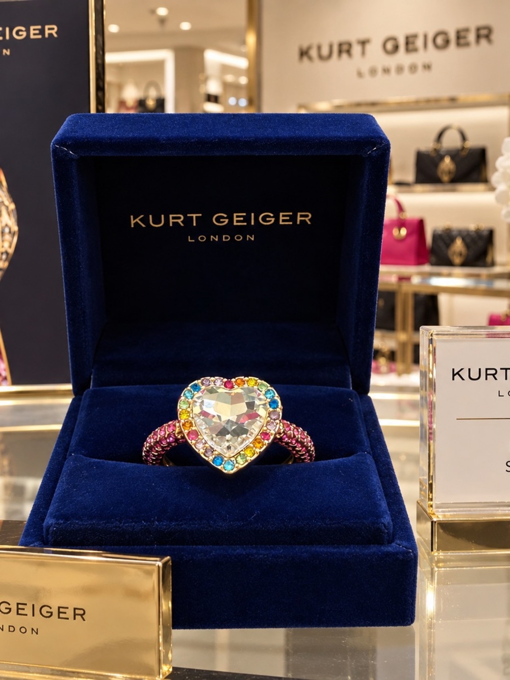 Kurt Geiger Heart Crystal Ring with Multicolor Stones and Pink Band